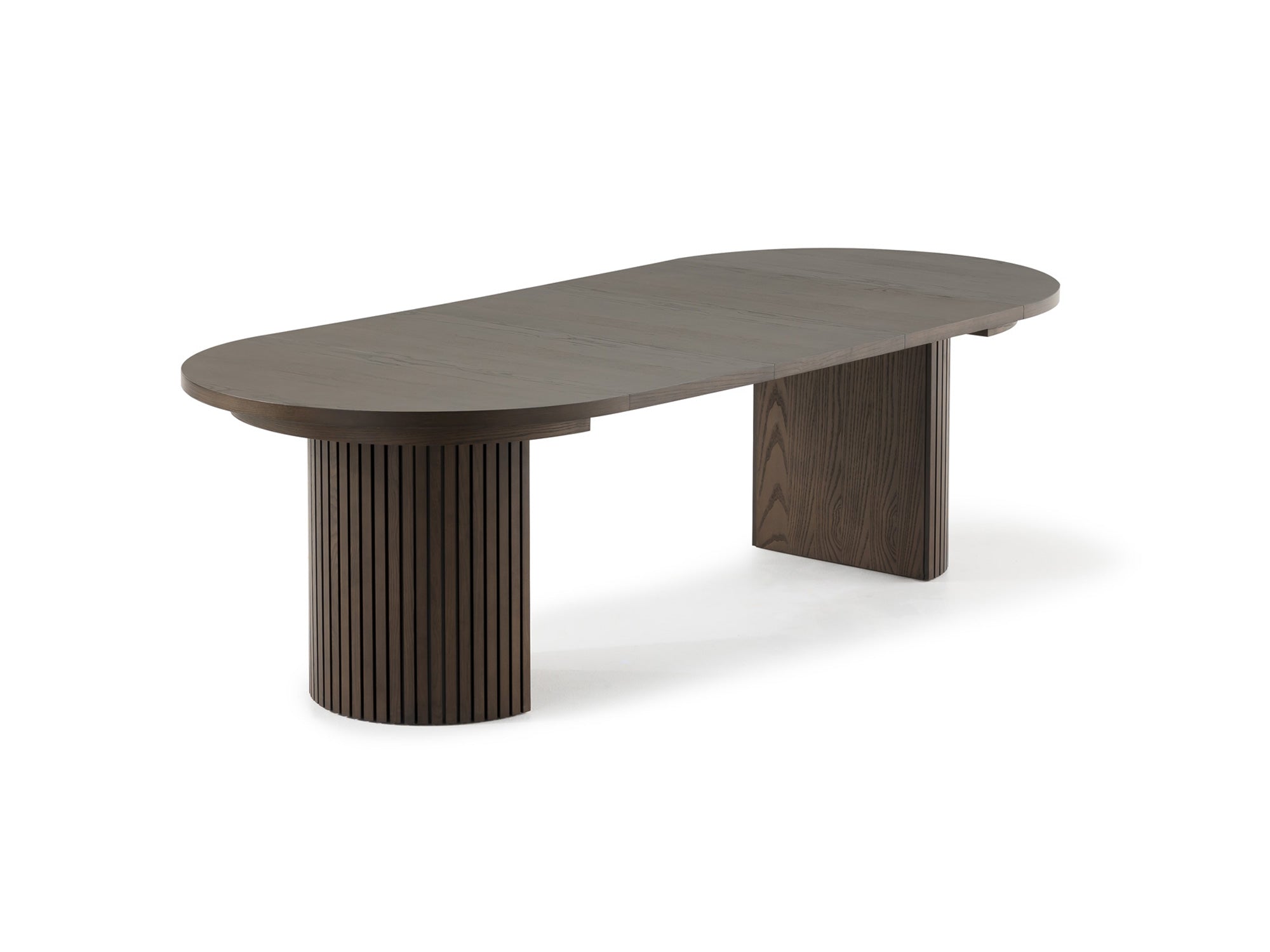Versatile expandable dining table seats 4‑10, robust hardwood‑steel build, hidden pedestal storage and elegant fluted detailing for flexible everyday dining.