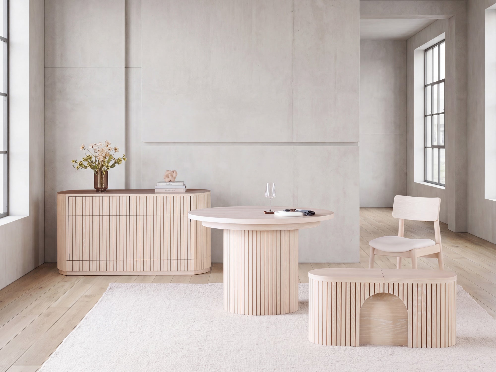 Versatile expandable dining table seats 4‑10, robust hardwood‑steel build, hidden pedestal storage and elegant fluted detailing for flexible everyday dining.