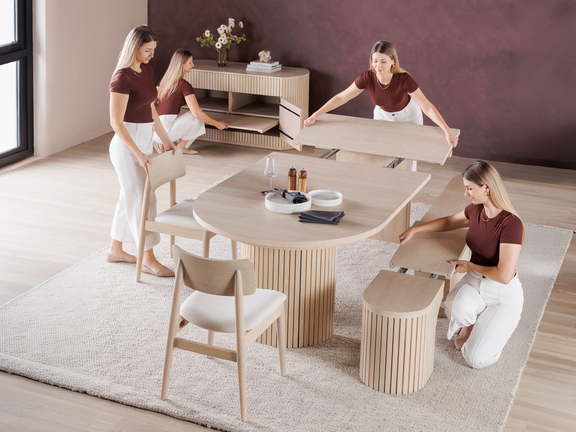 Versatile expandable dining table seats 4‑10, robust hardwood‑steel build, hidden pedestal storage and elegant fluted detailing for flexible everyday dining.