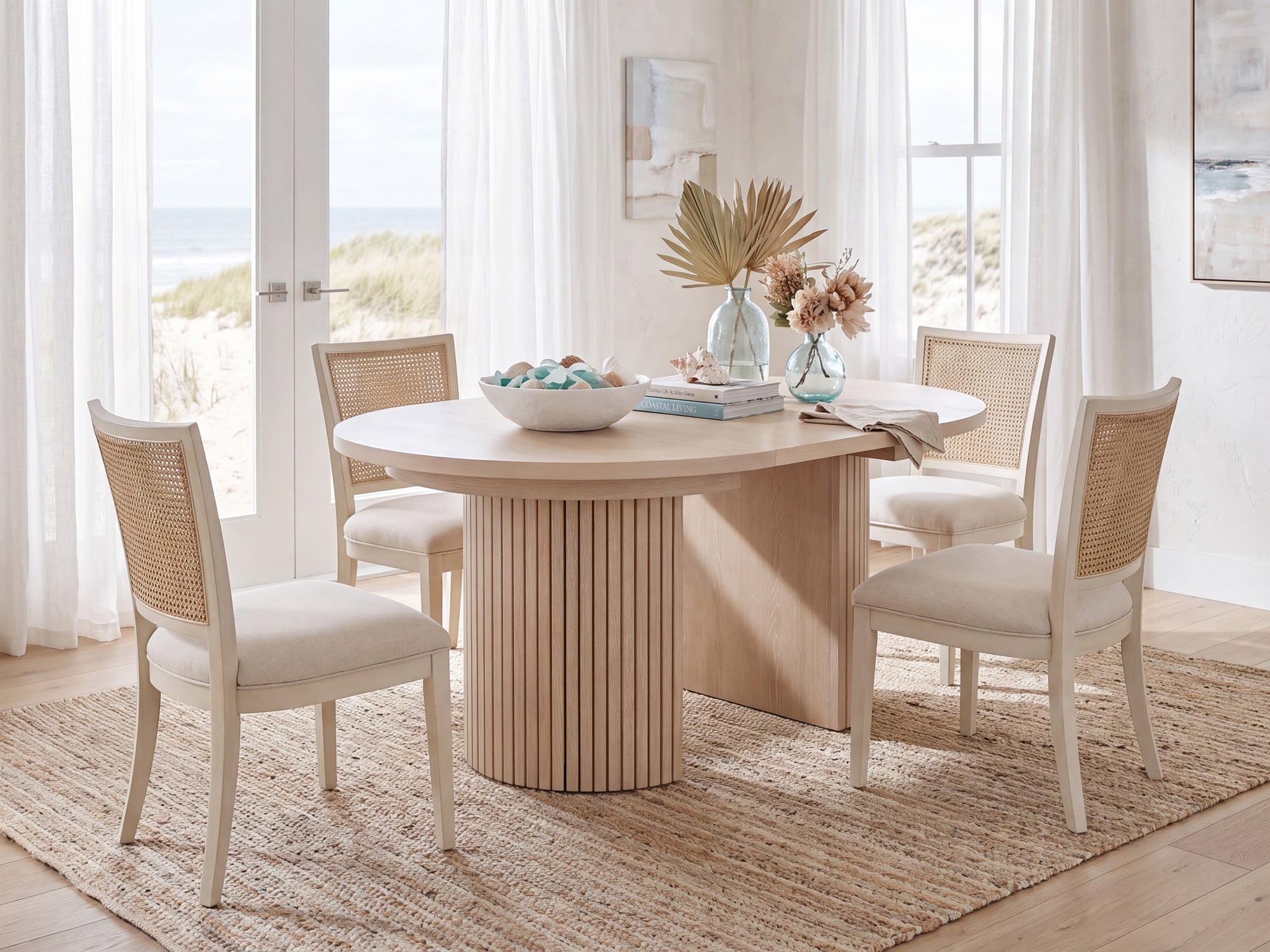Versatile expandable dining table seats 4‑10, robust hardwood‑steel build, hidden pedestal storage and elegant fluted detailing for flexible everyday dining.