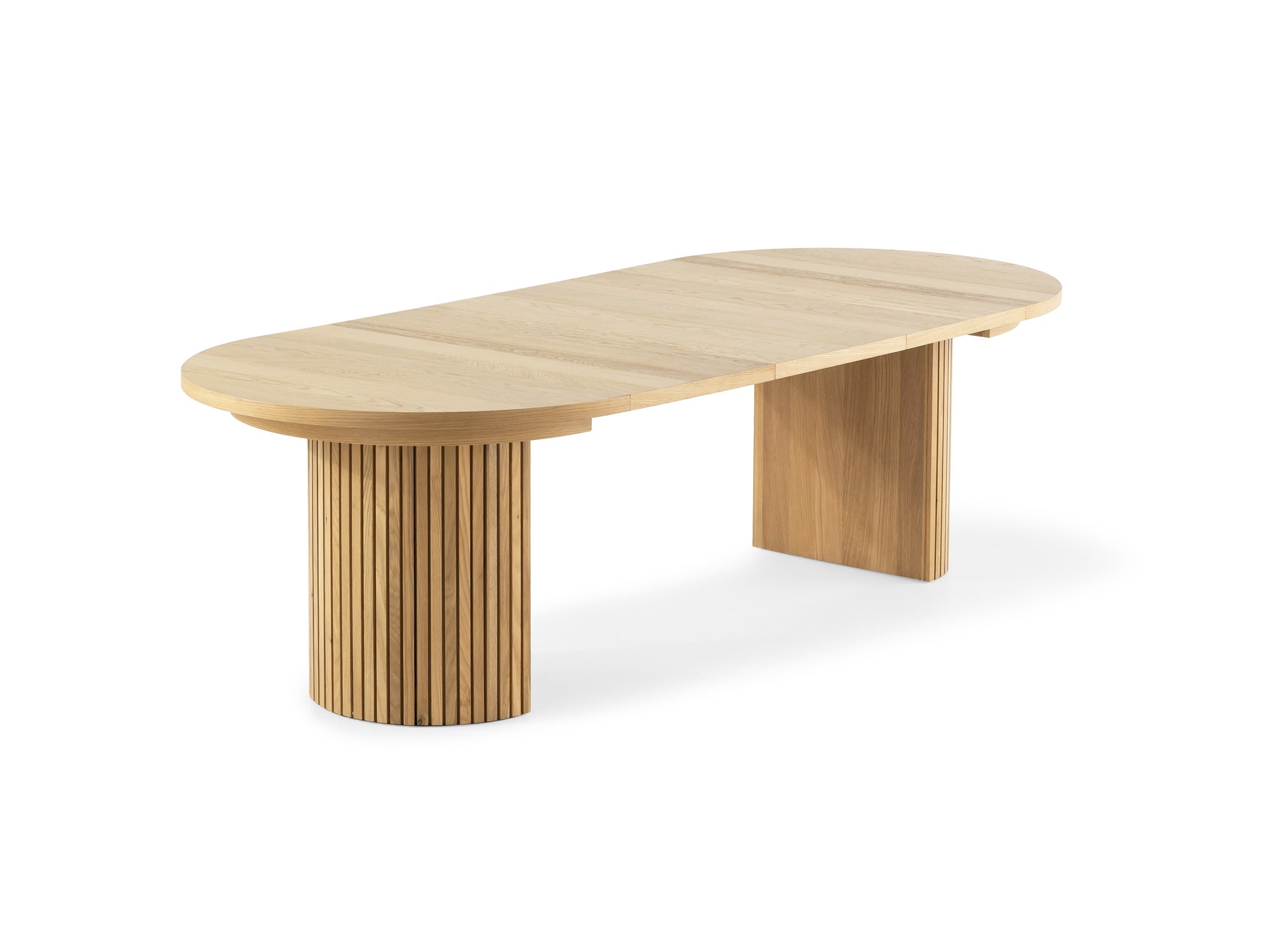 Versatile expandable dining table seats 4‑10, robust hardwood‑steel build, hidden pedestal storage and elegant fluted detailing for flexible everyday dining.