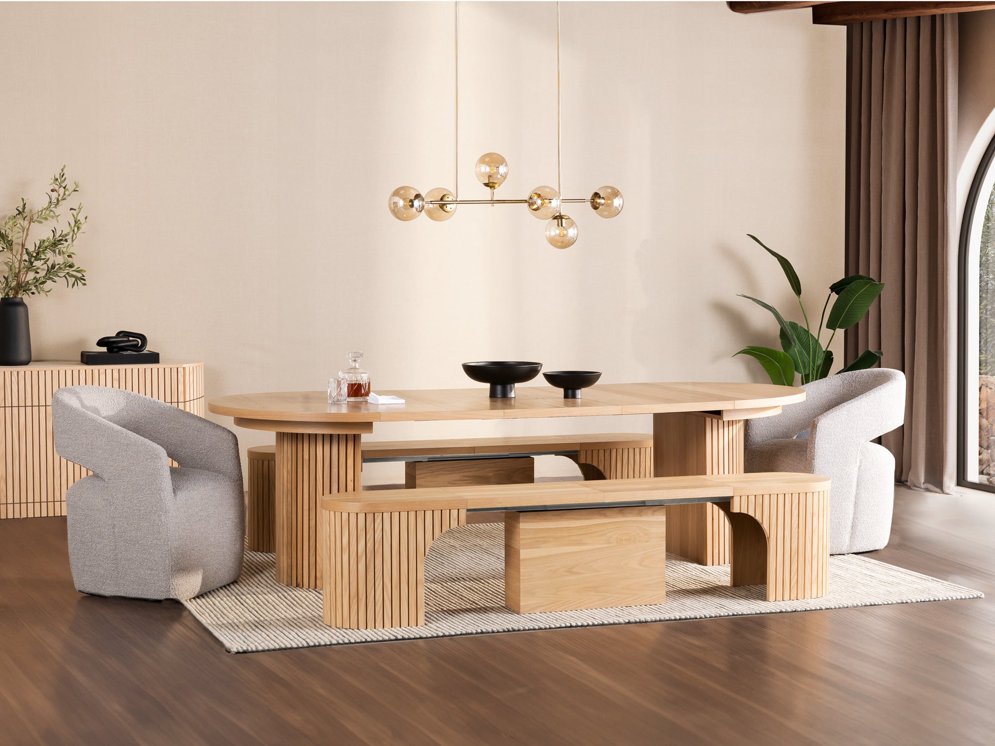 Practical extendable round dining set; storage‑built bench holds extra panels, robust hardwood build, smooth gliding rails and matching premium finishes.