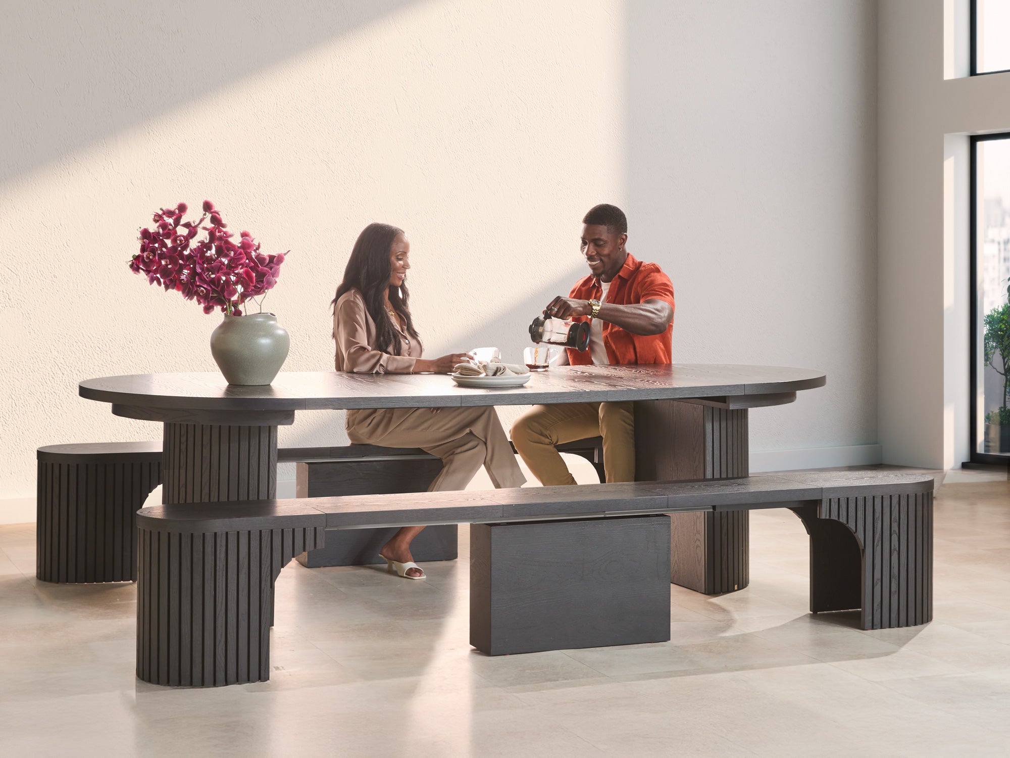 Practical extendable round dining set; storage‑built bench holds extra panels, robust hardwood build, smooth gliding rails and matching premium finishes.