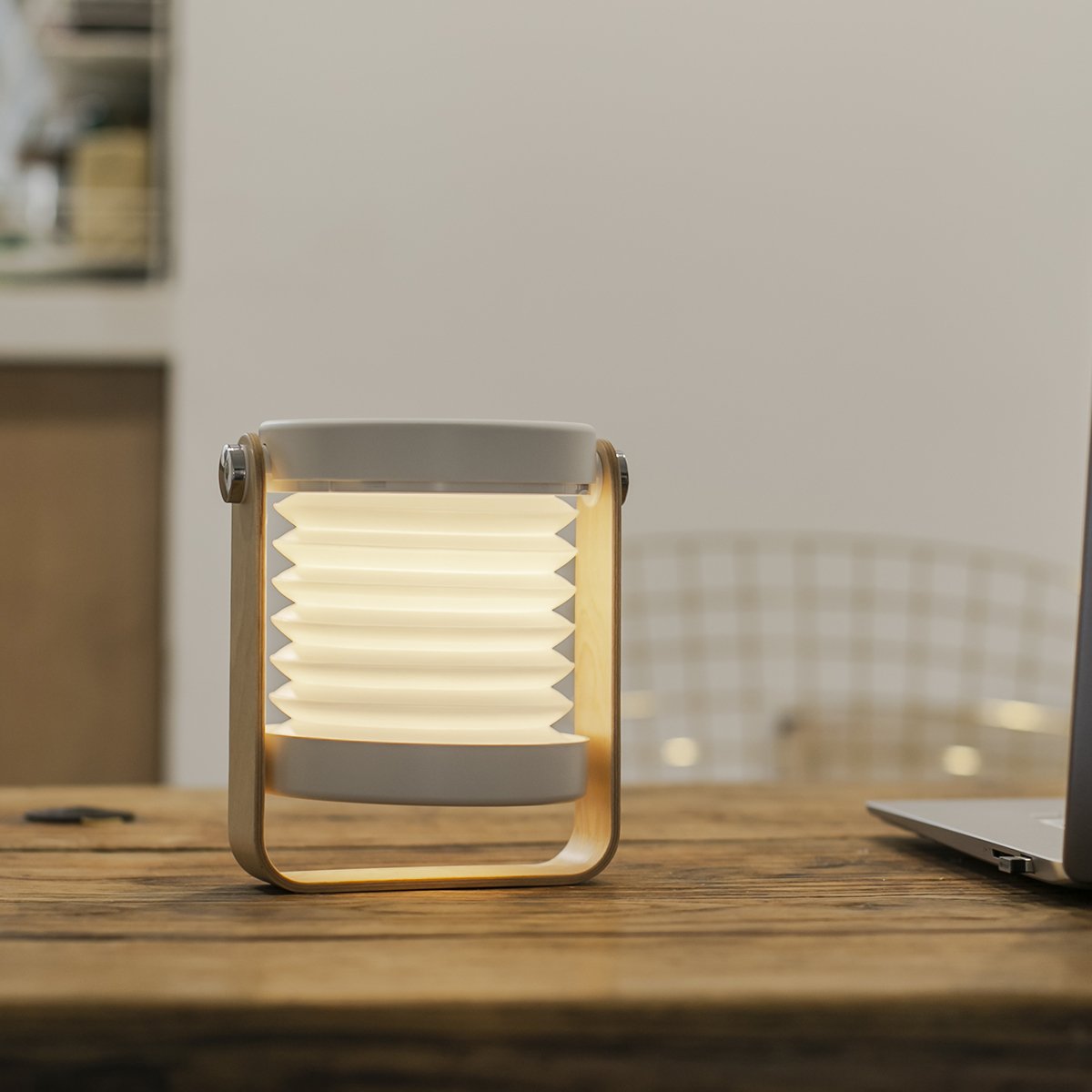 Transformable USB‑rechargeable lamp with touch dimming and 360° rotation, portable cord‑free lighting for indoor and outdoor use.
