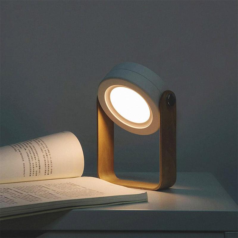 Transformable USB‑rechargeable lamp with touch dimming and 360° rotation, portable cord‑free lighting for indoor and outdoor use.