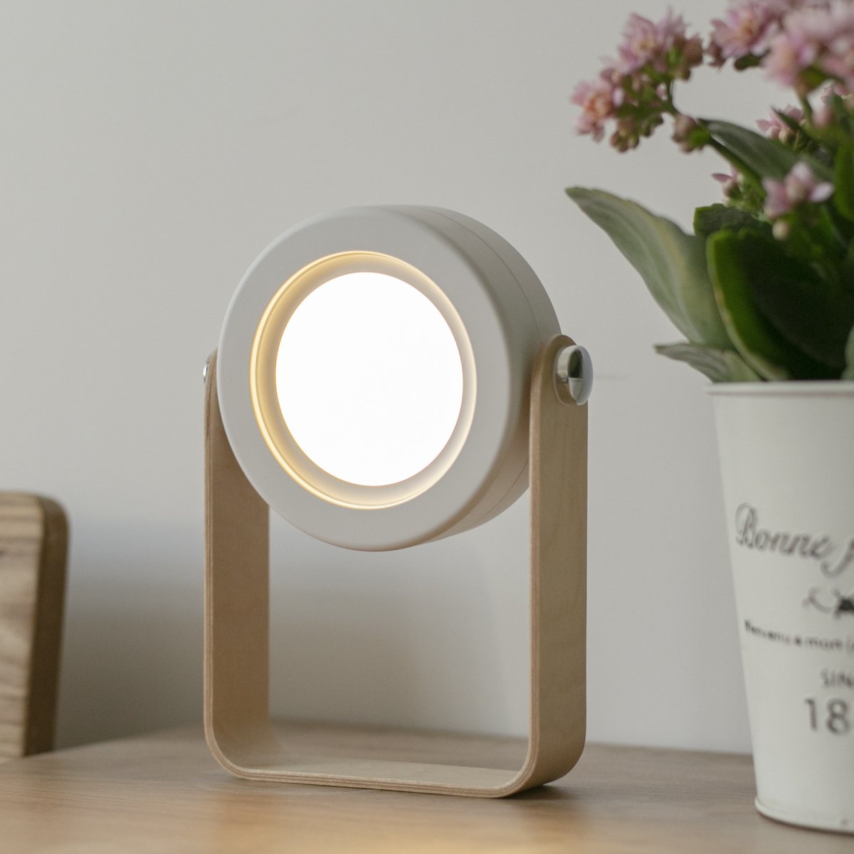 Transformable USB‑rechargeable lamp with touch dimming and 360° rotation, portable cord‑free lighting for indoor and outdoor use.