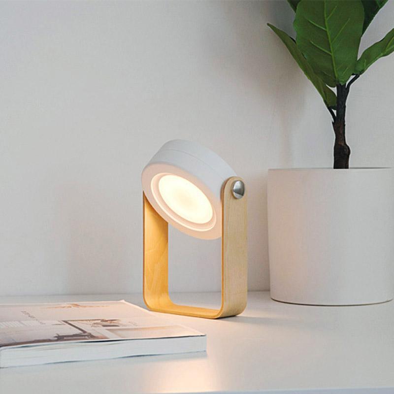 Transformable USB‑rechargeable lamp with touch dimming and 360° rotation, portable cord‑free lighting for indoor and outdoor use.
