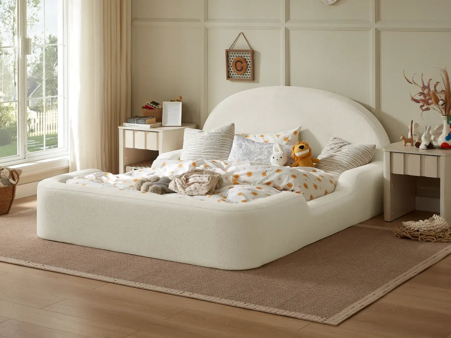 Safe fully cushioned toddler bed with no sharp edges, waterproof washable cover and tool-free assembly, perfect for smooth big-kid bed transitions for ages 3+.