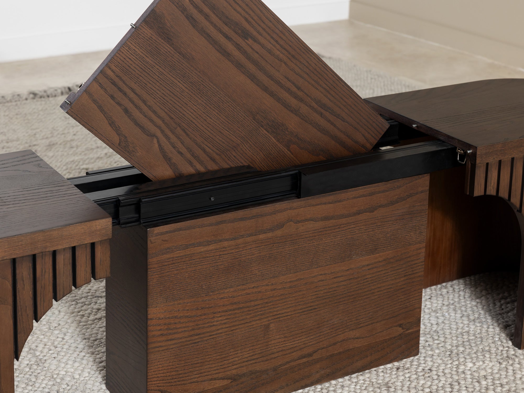 Practical extendable round dining set; storage‑built bench holds extra panels, robust hardwood build, smooth gliding rails and matching premium finishes.