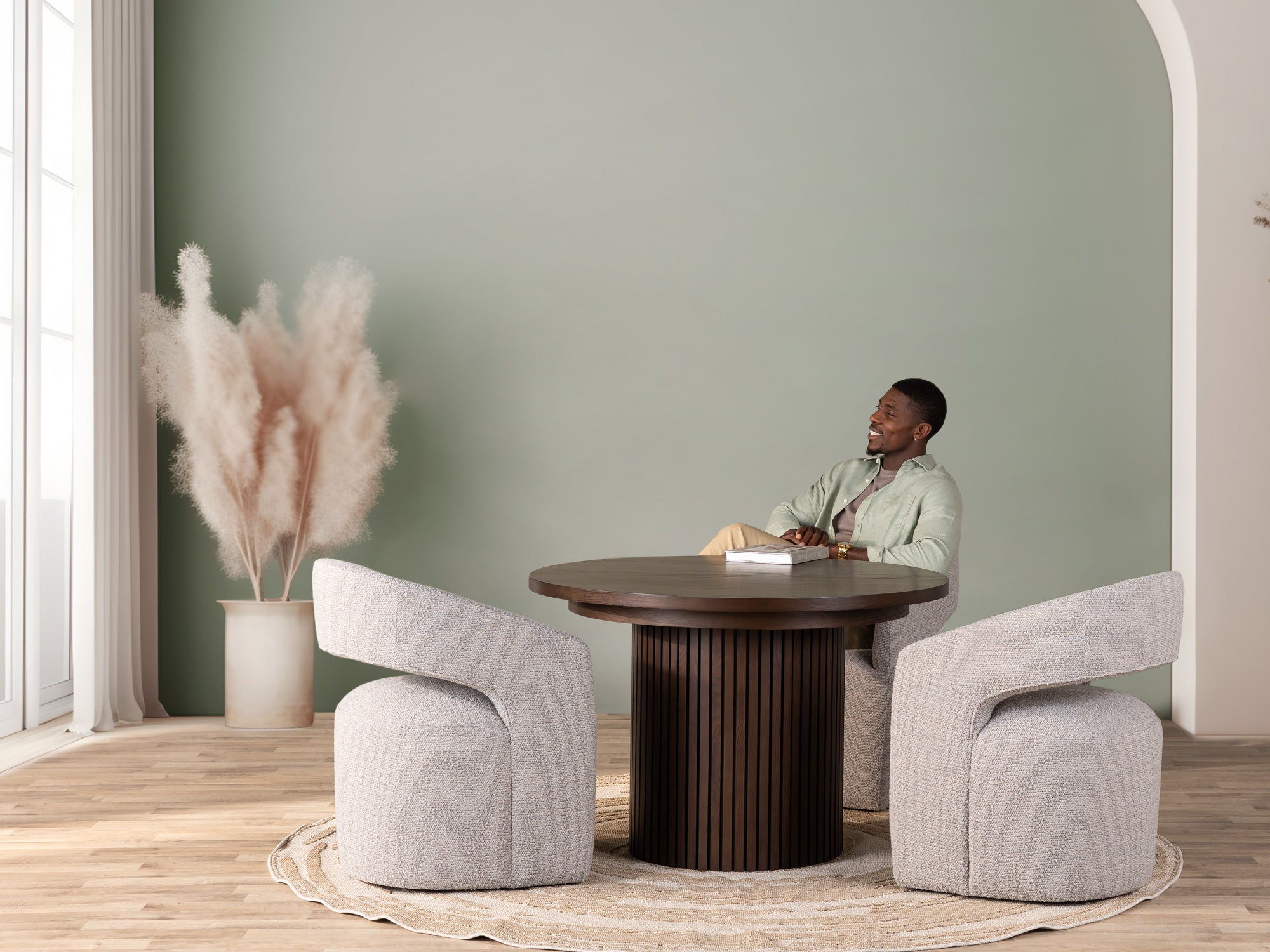 Versatile expandable dining table seats 4‑10, robust hardwood‑steel build, hidden pedestal storage and elegant fluted detailing for flexible everyday dining.