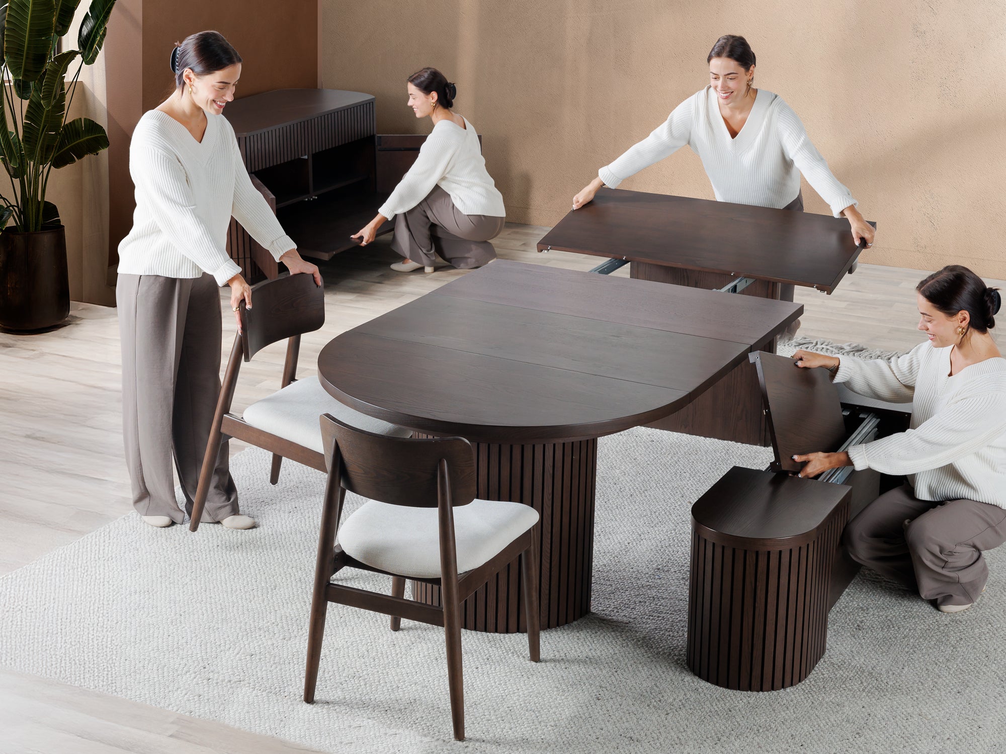 Versatile expandable dining table seats 4‑10, robust hardwood‑steel build, hidden pedestal storage and elegant fluted detailing for flexible everyday dining.