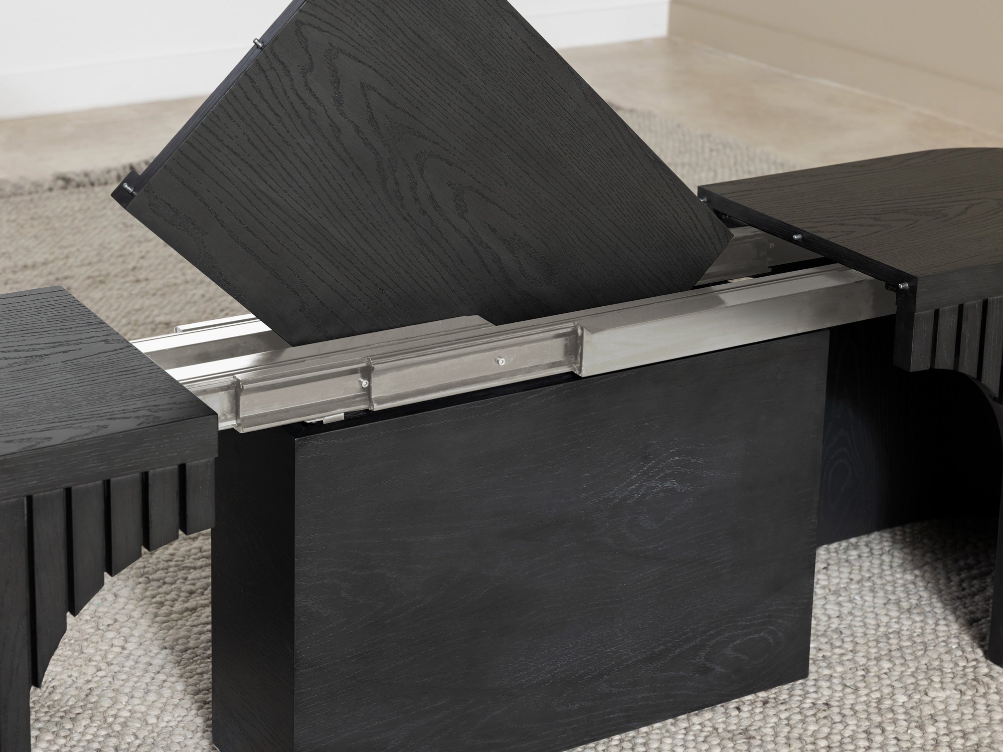 Practical extendable round dining set; storage‑built bench holds extra panels, robust hardwood build, smooth gliding rails and matching premium finishes.
