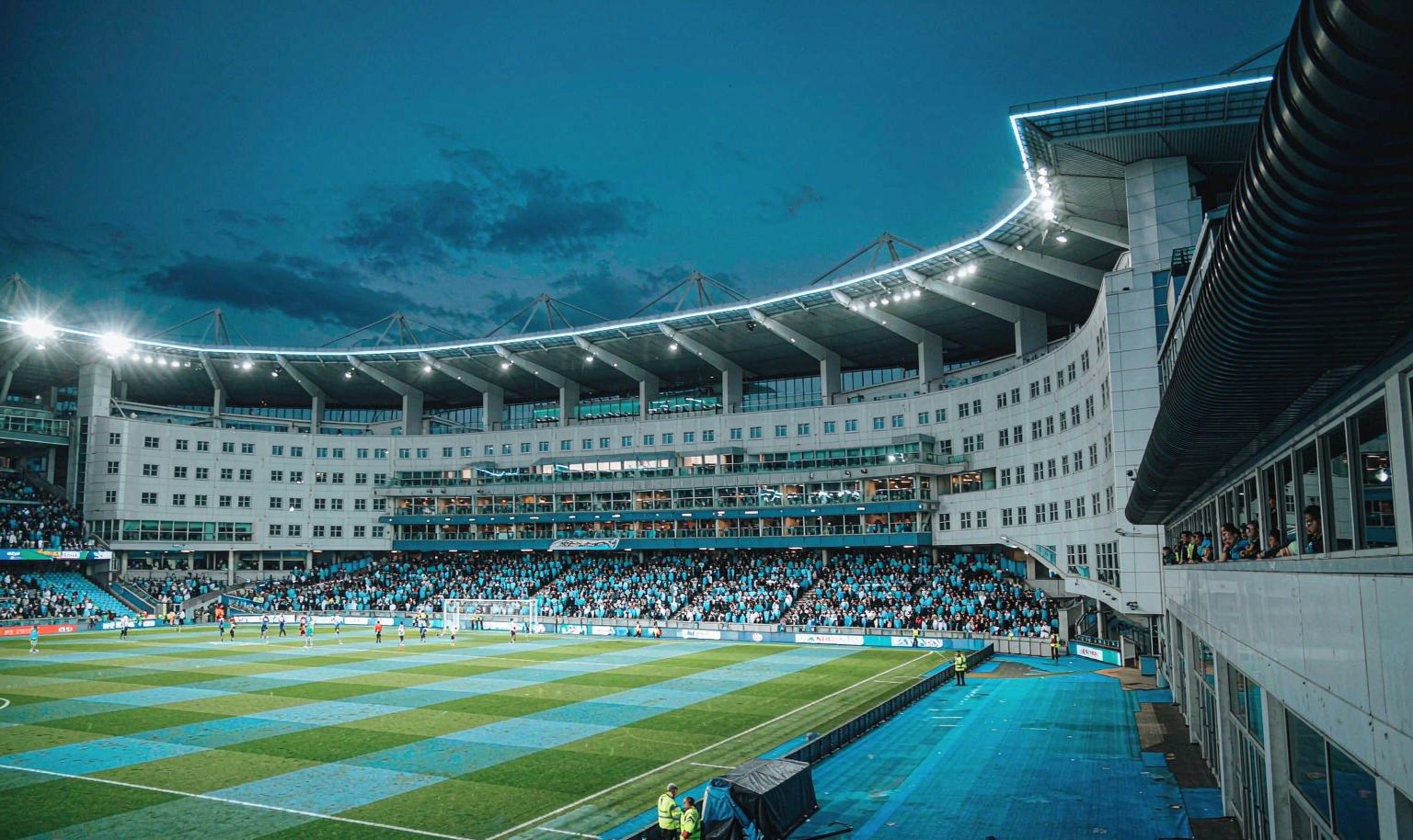 Etihad Stadium at night - sky blue