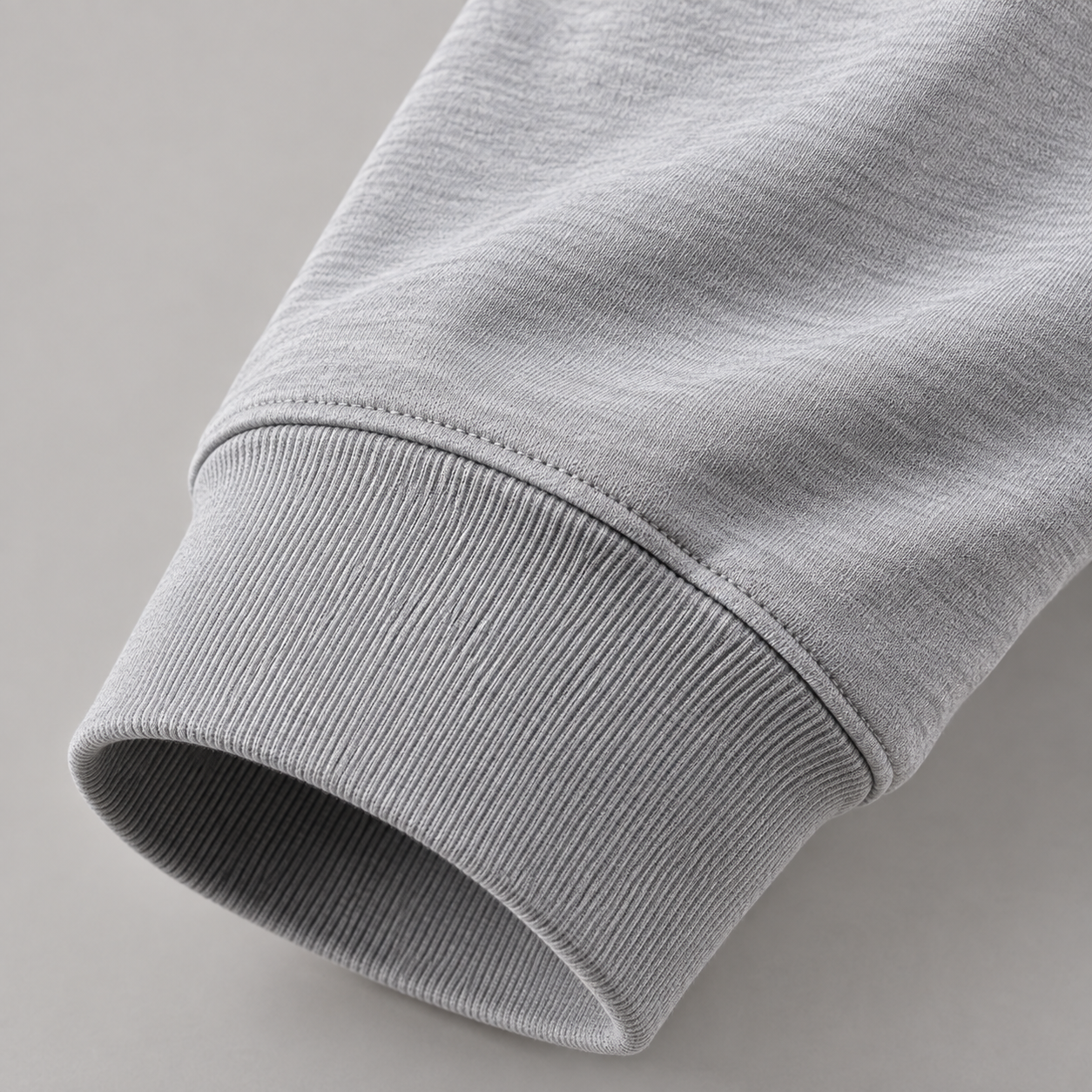 Long-sleeve polo ribbed cuff and sleeve seam detail