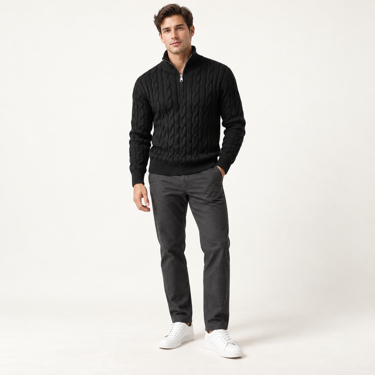 Male model wearing the Black cable-knit quarter-zip stand-collar sweater, front fit
