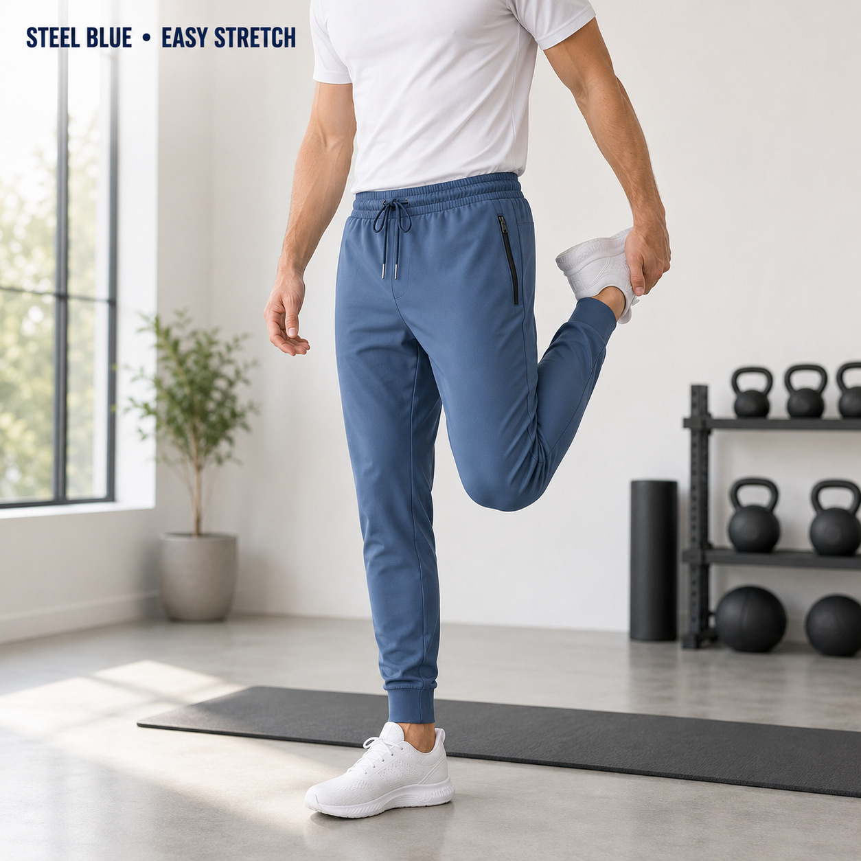 Steel blue lightweight jogger pants in a warm-up setting