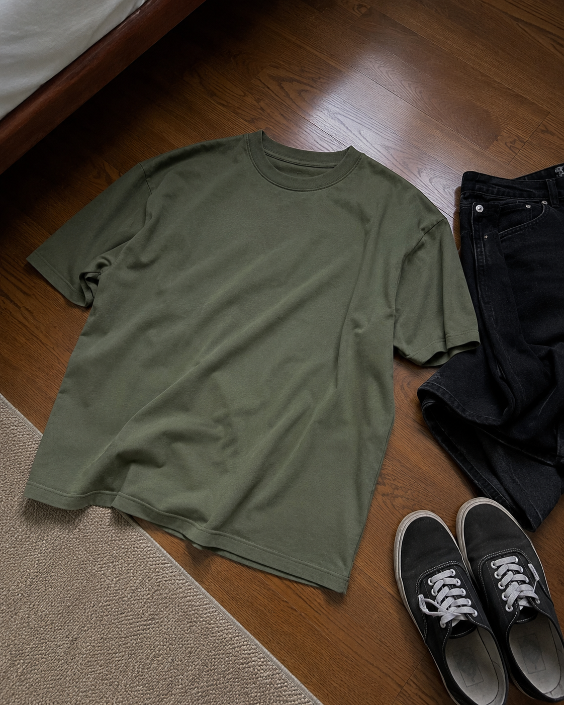 Sage green oversized drop-shoulder T-shirt arranged in a flat-lay