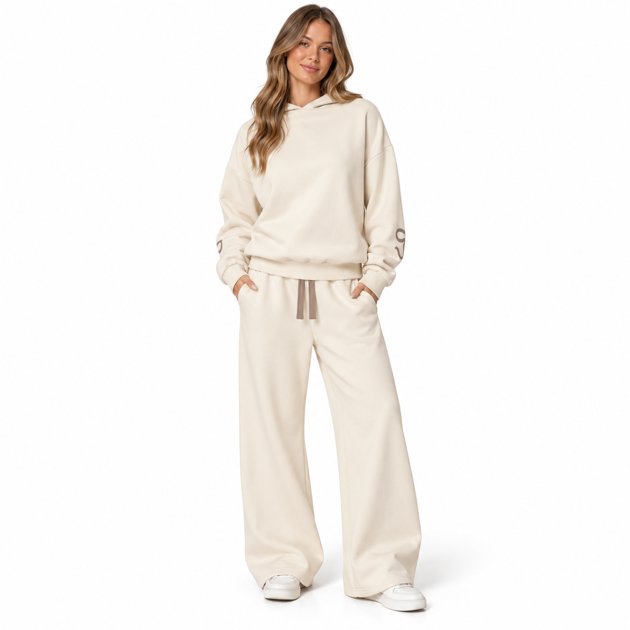 Woman wearing the Warm Cream and Mocha set from the front with bow-free pant fronts