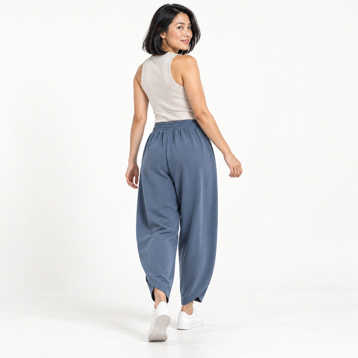 Woman wearing Coffee Brown wide-leg harem pants, plain studio back view