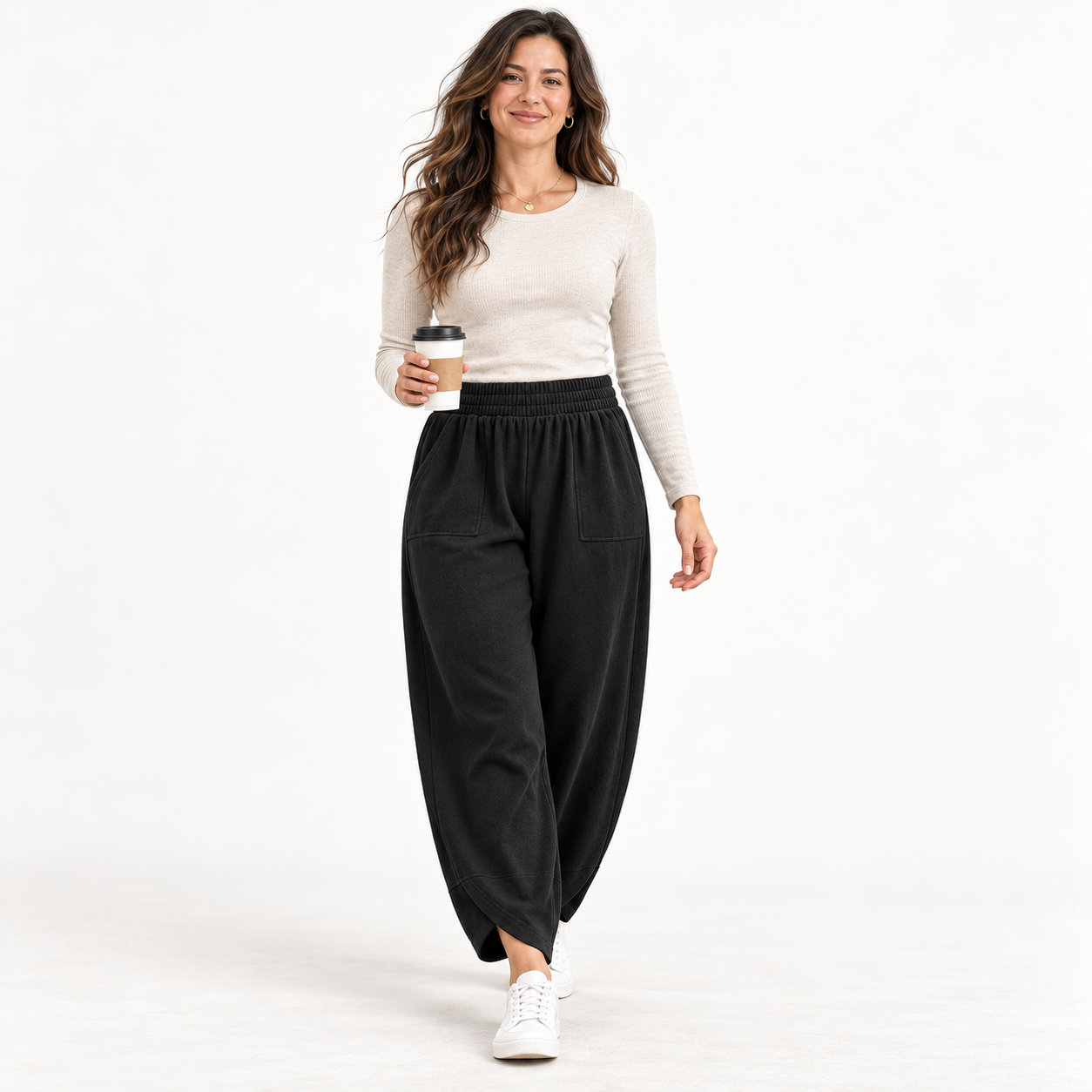 Woman wearing Black wide-leg harem pants, clean studio front view