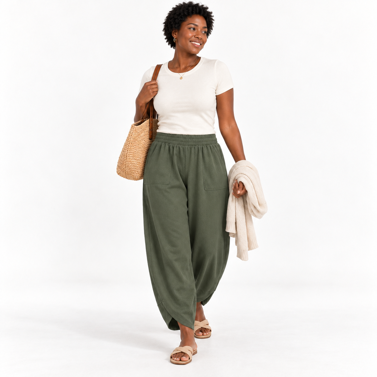 Woman wearing Olive Green wide-leg harem pants, natural studio front view