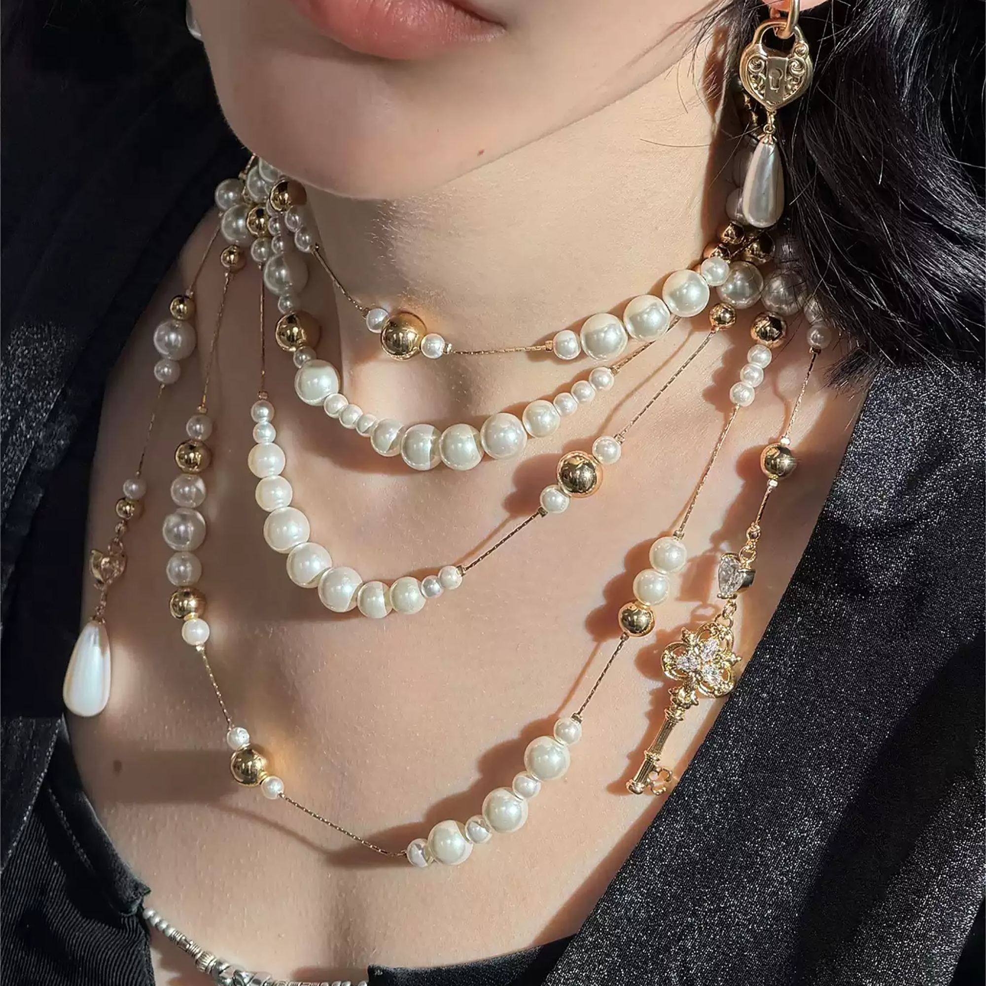 Chilpérique White Layered Pearl Key Long Necklace