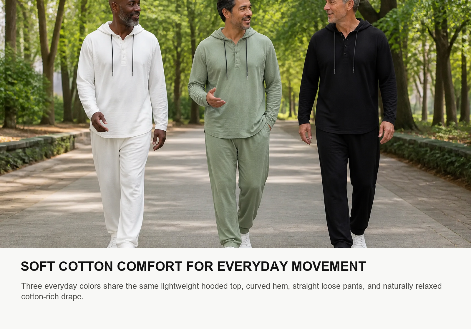 Three men wearing white sage green and black soft cotton hooded two-piece casual sets in a park
