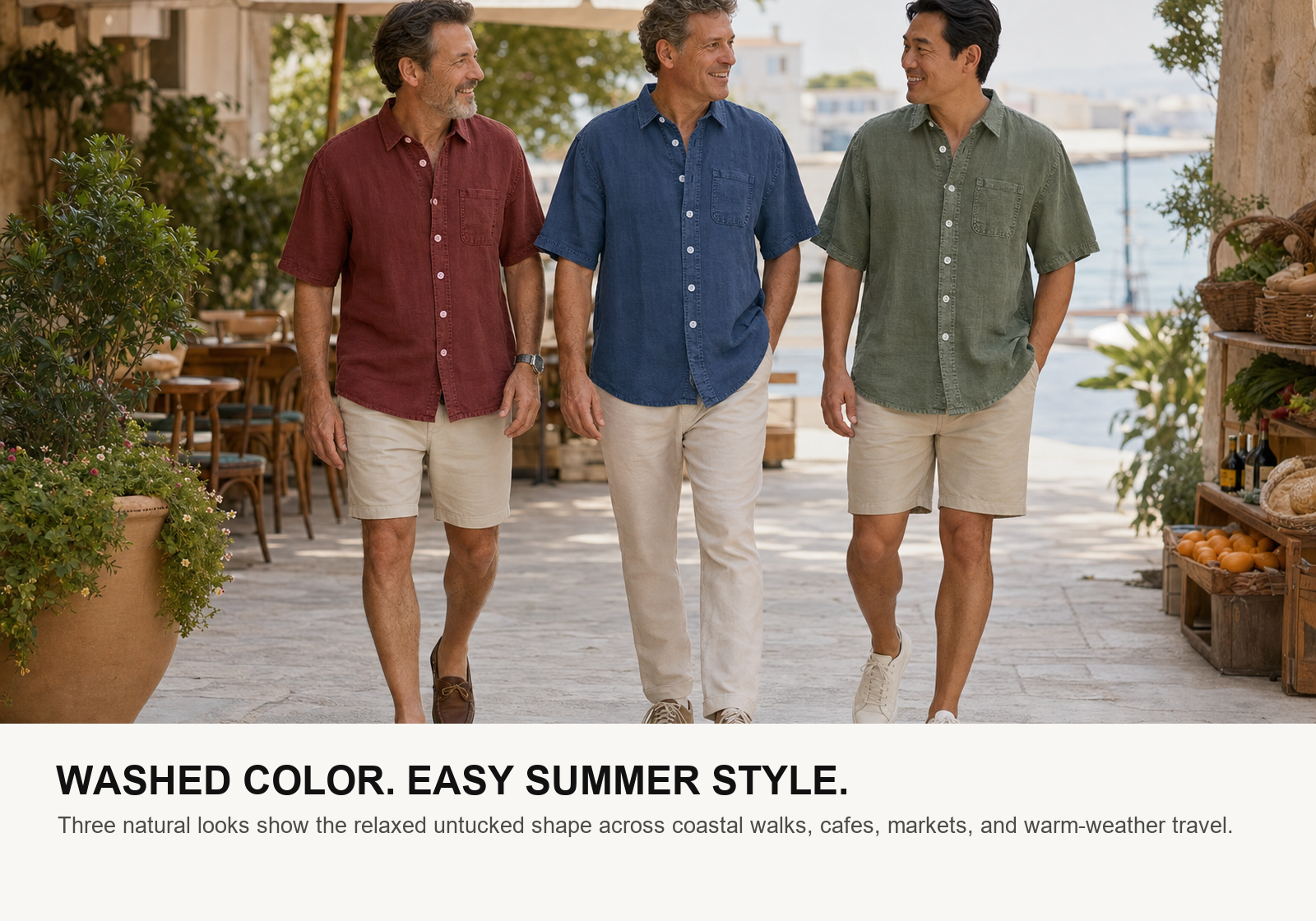 Three men wearing burgundy navy and sage washed cotton linen short sleeve pocket shirts by the coast