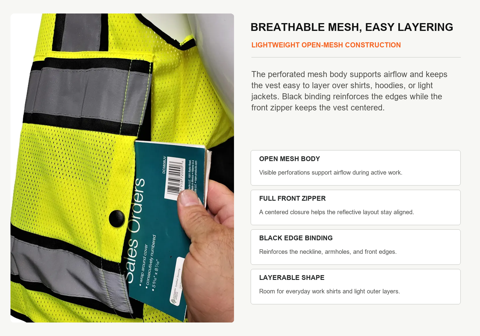 Close view of breathable mesh fabric reflective tape edge binding and pocket on a safety vest