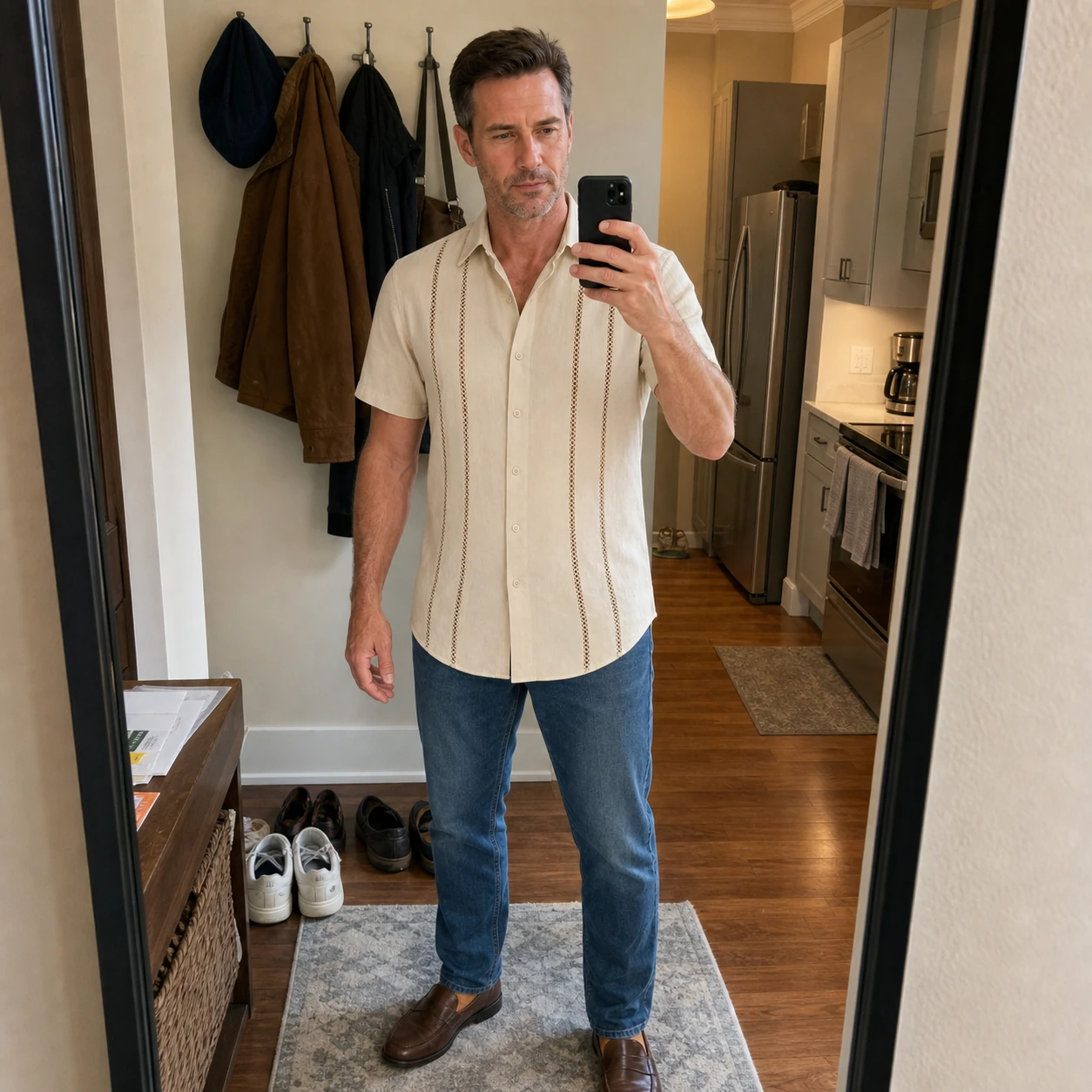 Beige Cuban-inspired shirt in an everyday entryway mirror photo