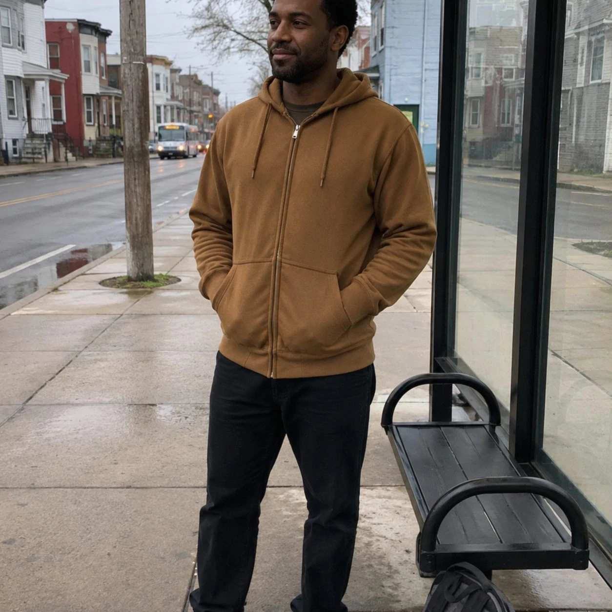 Work Brown full-zip hoodie at an ordinary city bus stop