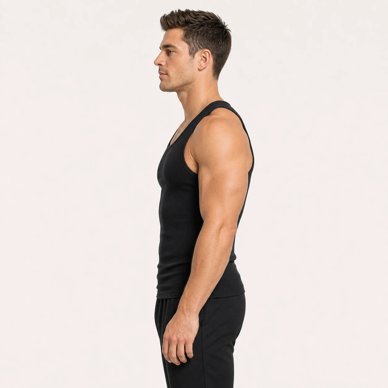 Side view of the Black ribbed athletic tank top