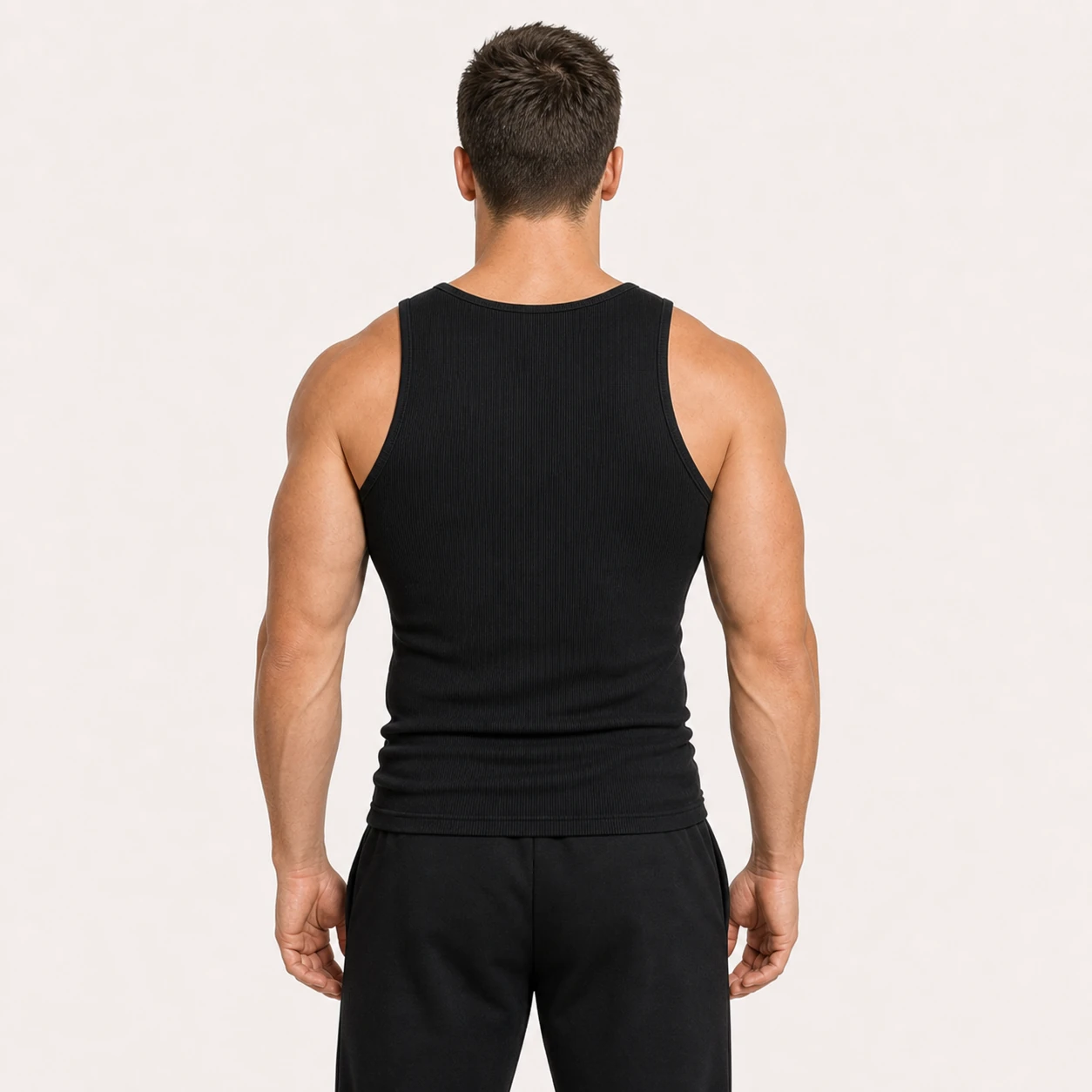 Back view of the Black ribbed athletic tank top