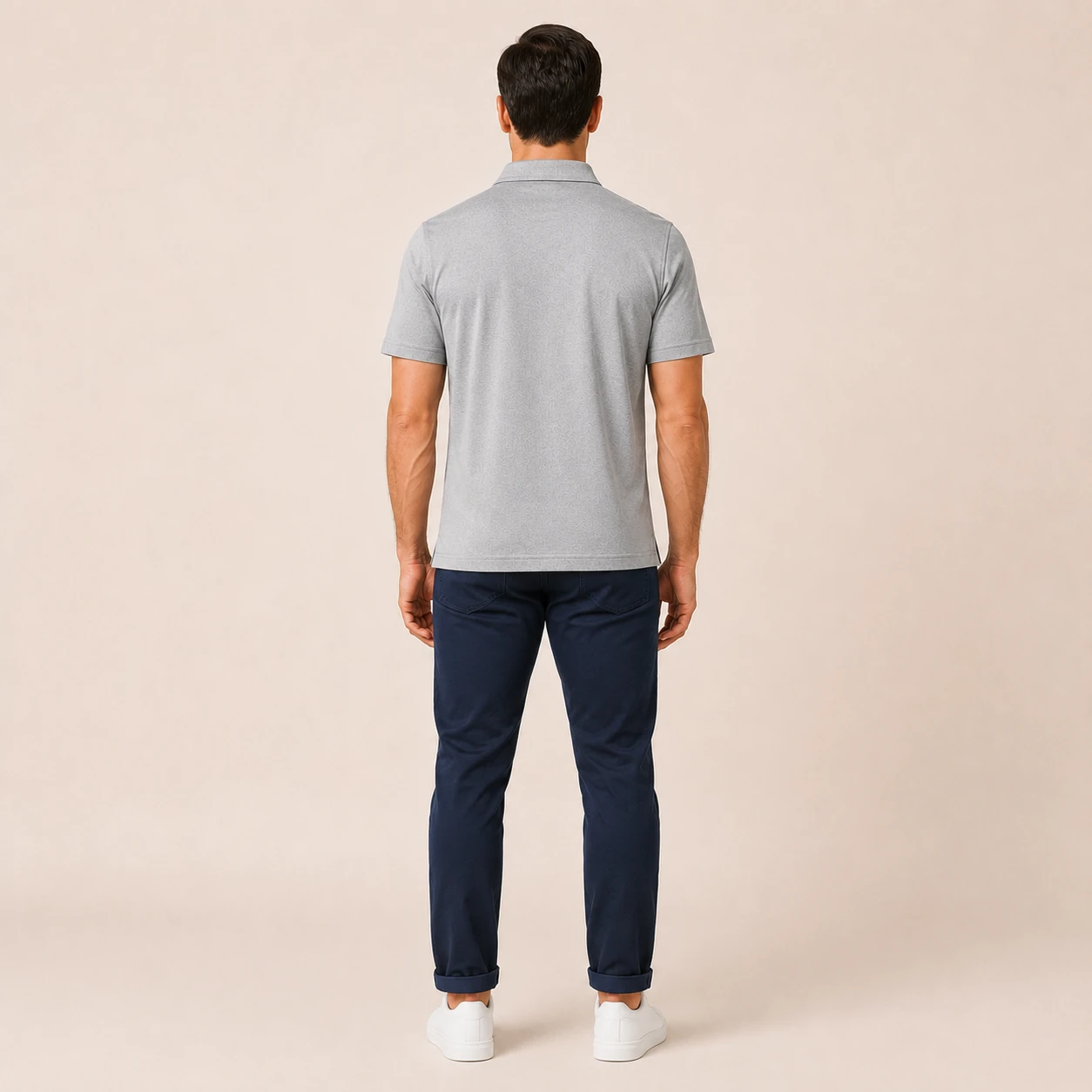 Back view of a model wearing the classic fit polo shirt