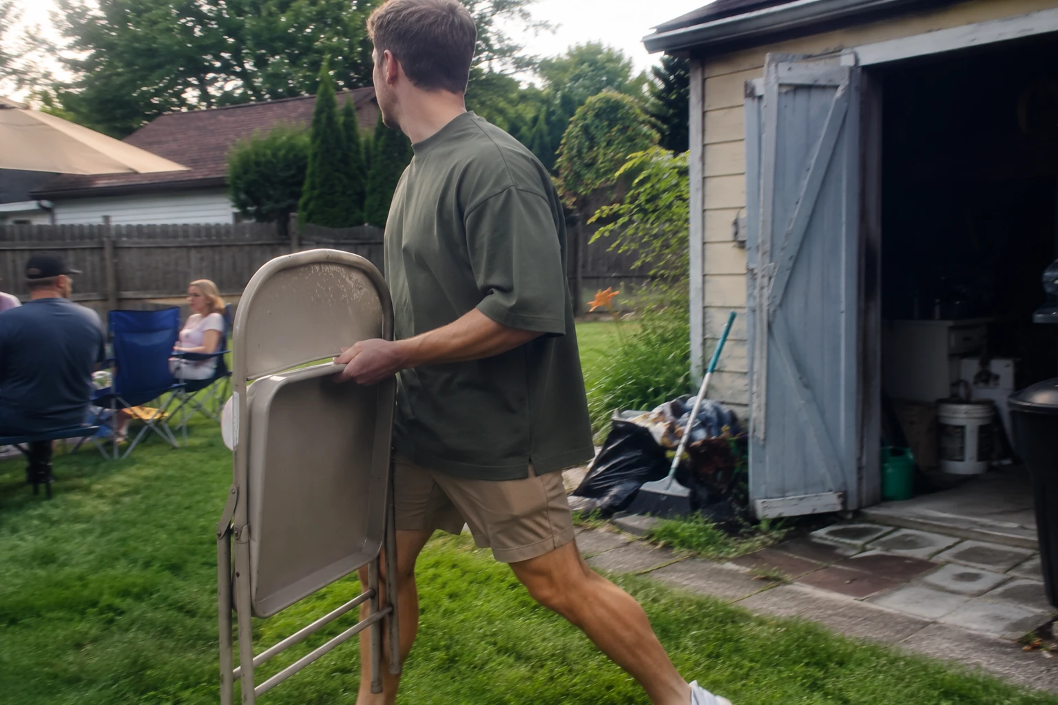 Casual phone snapshot of the Utility Green oversized T-shirt