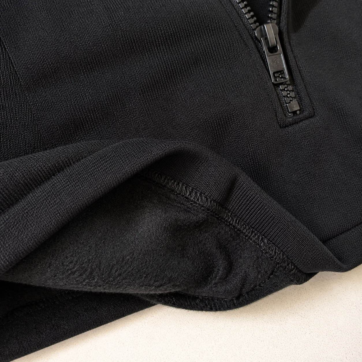 Plain knit outer fabric and soft brushed fleece interior
