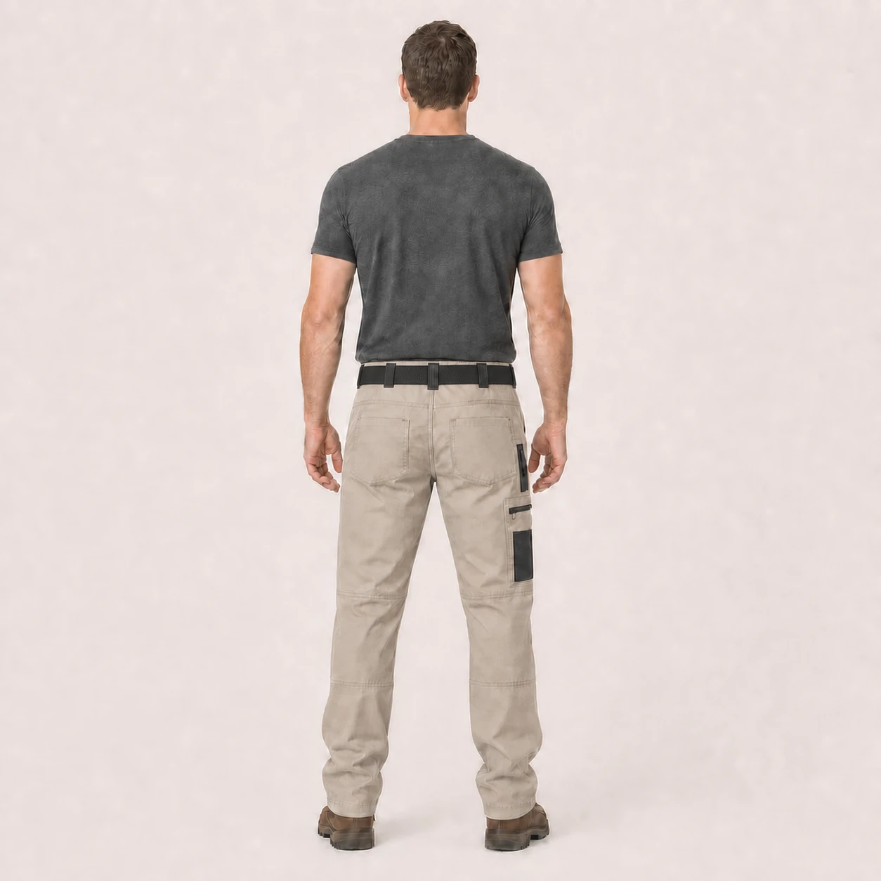 Back view of model wearing khaki tactical cargo pants