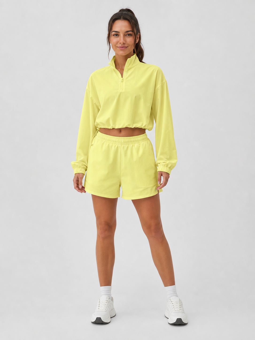 Women's citrus yellow half-zip pullover and shorts set front view