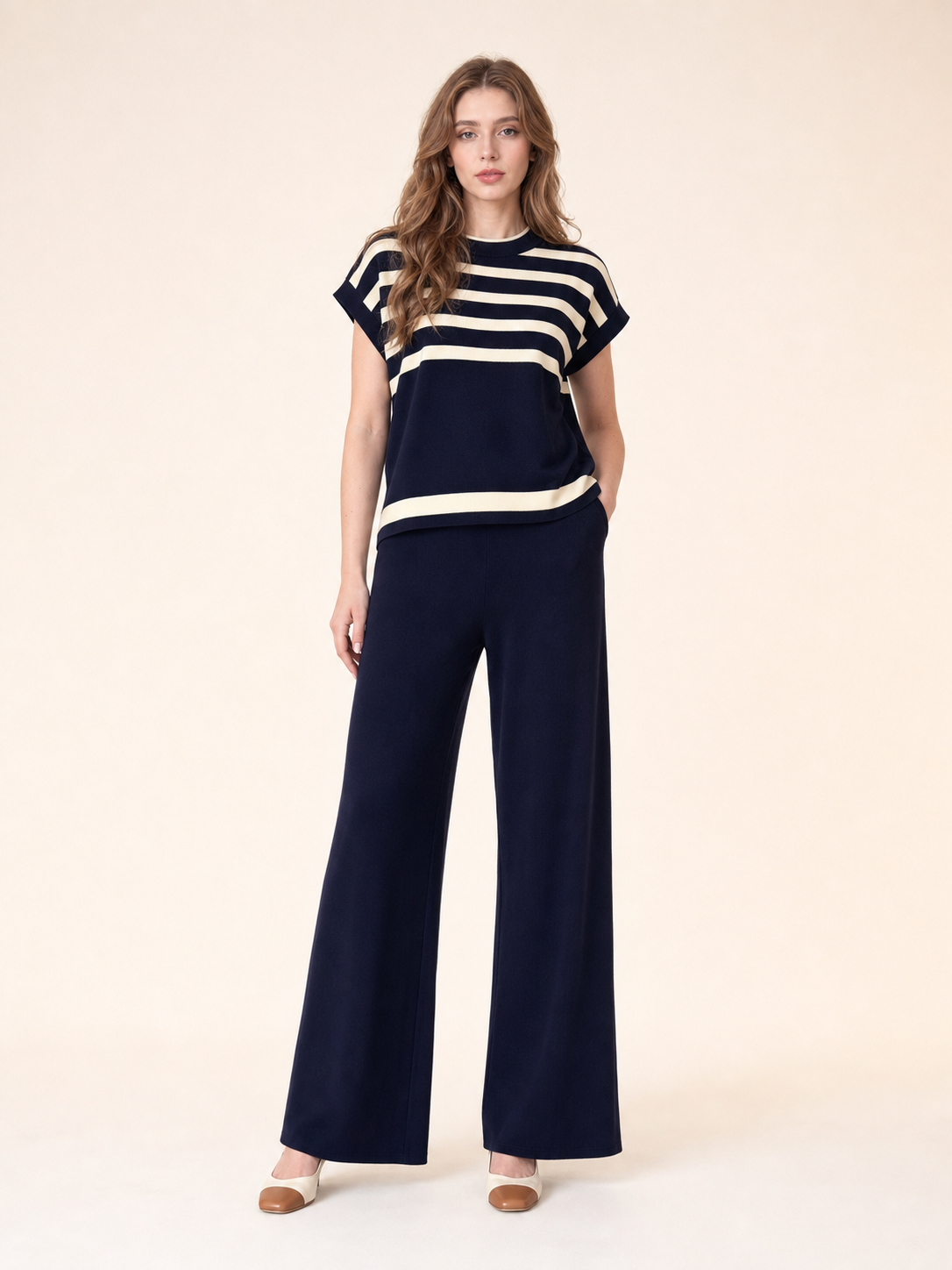 Front view of women's navy and cream striped knit wide-leg set