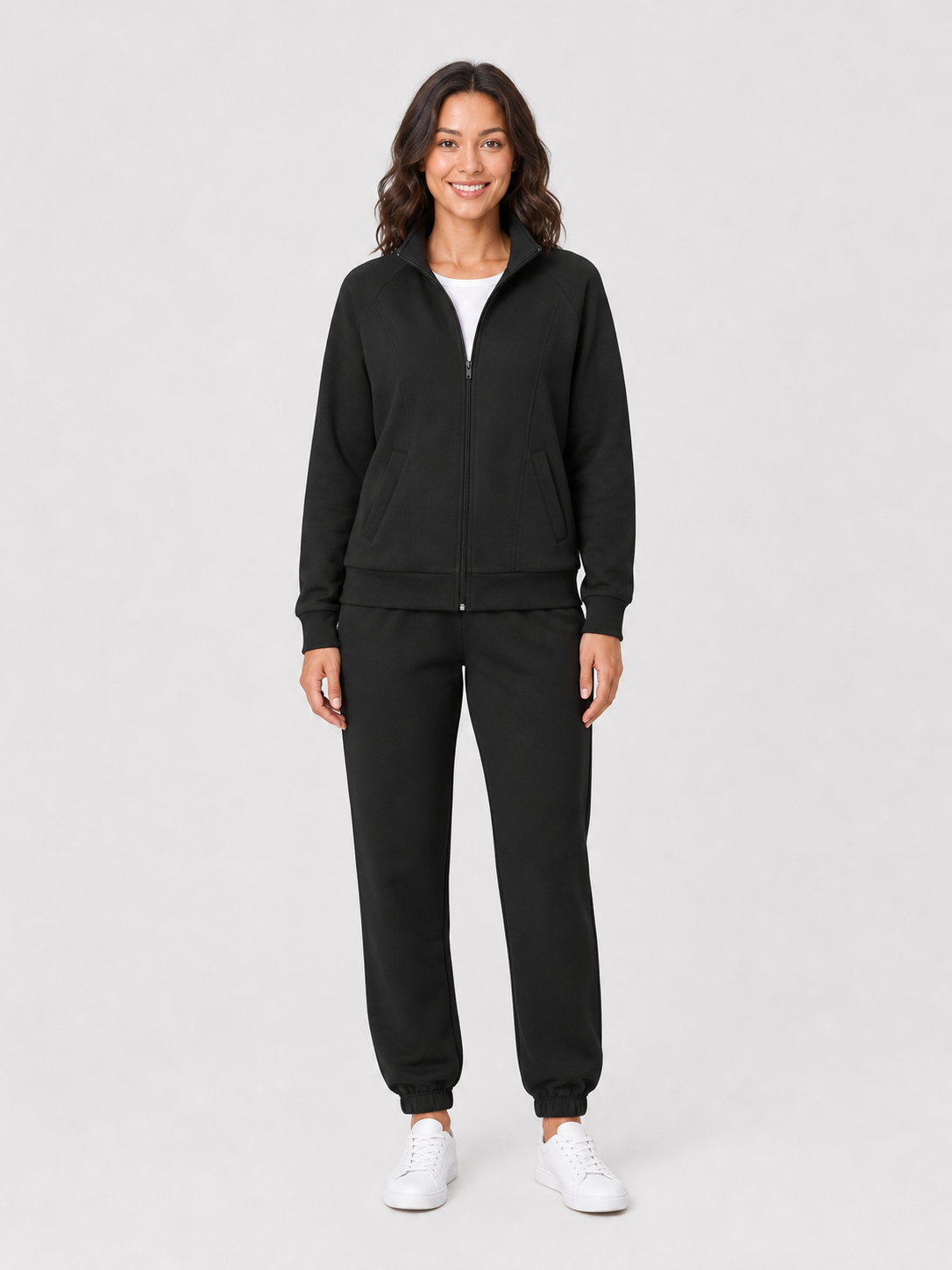 Women's black full-zip jacket and tapered jogger set front view