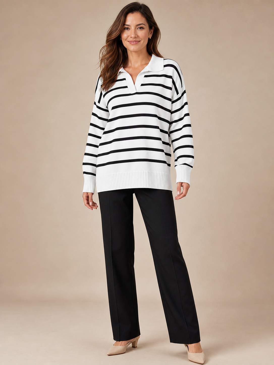 Front view of women's black and white striped collared knit top