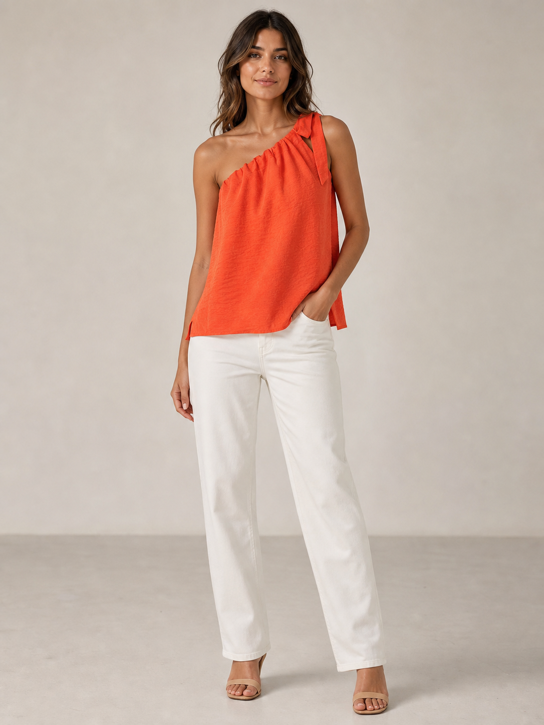 Women's coral orange one-shoulder tie loose top front view