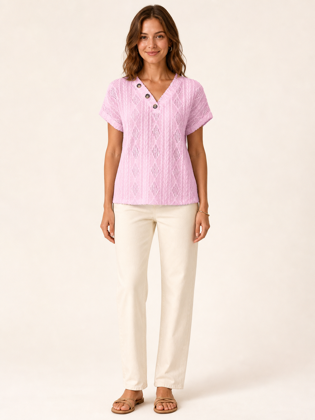 Women's pink openwork three-button top front view