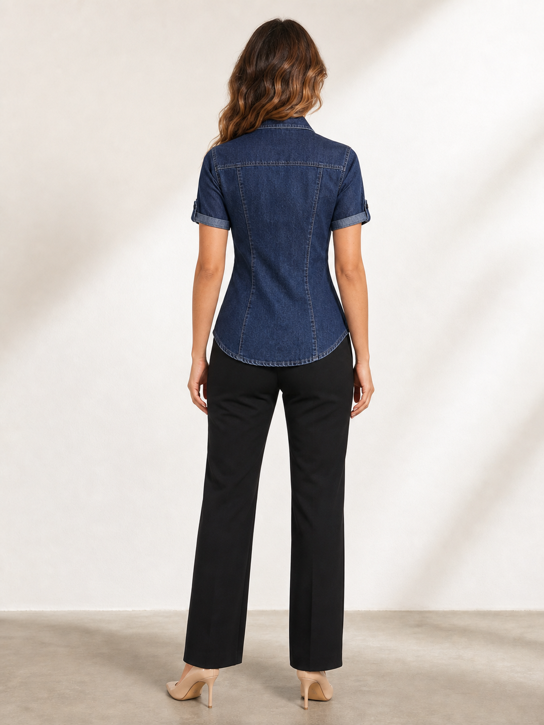 Women's dark indigo washed denim fitted short-sleeve shirt back view