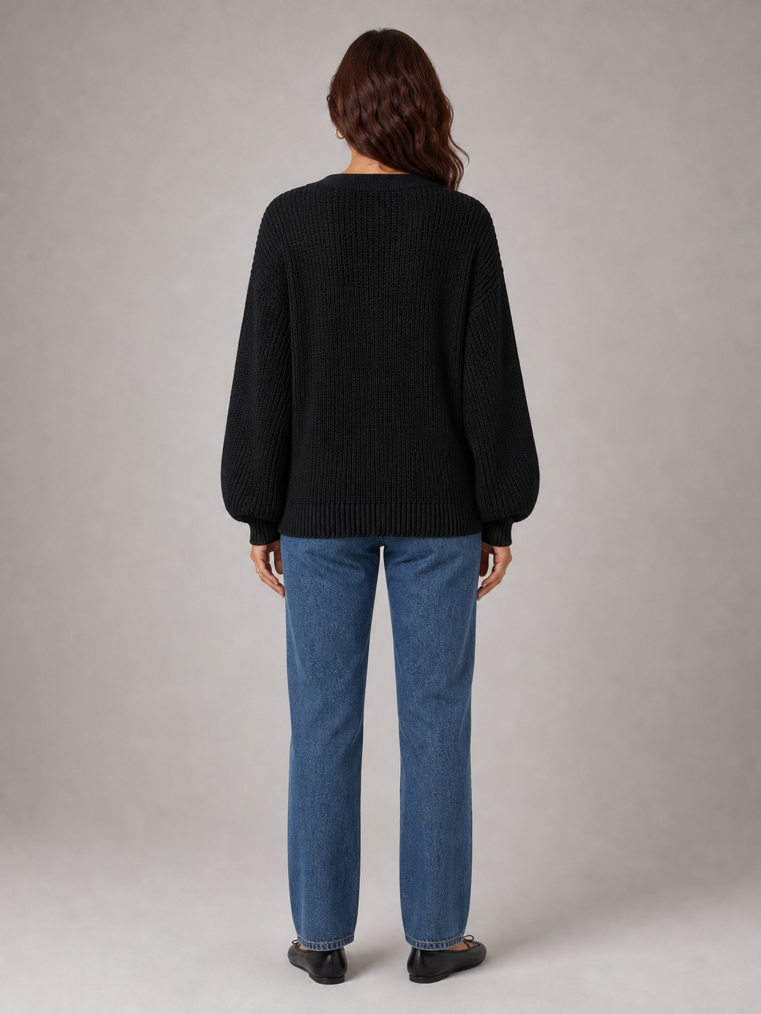 Women's black open-knit cardigan back view