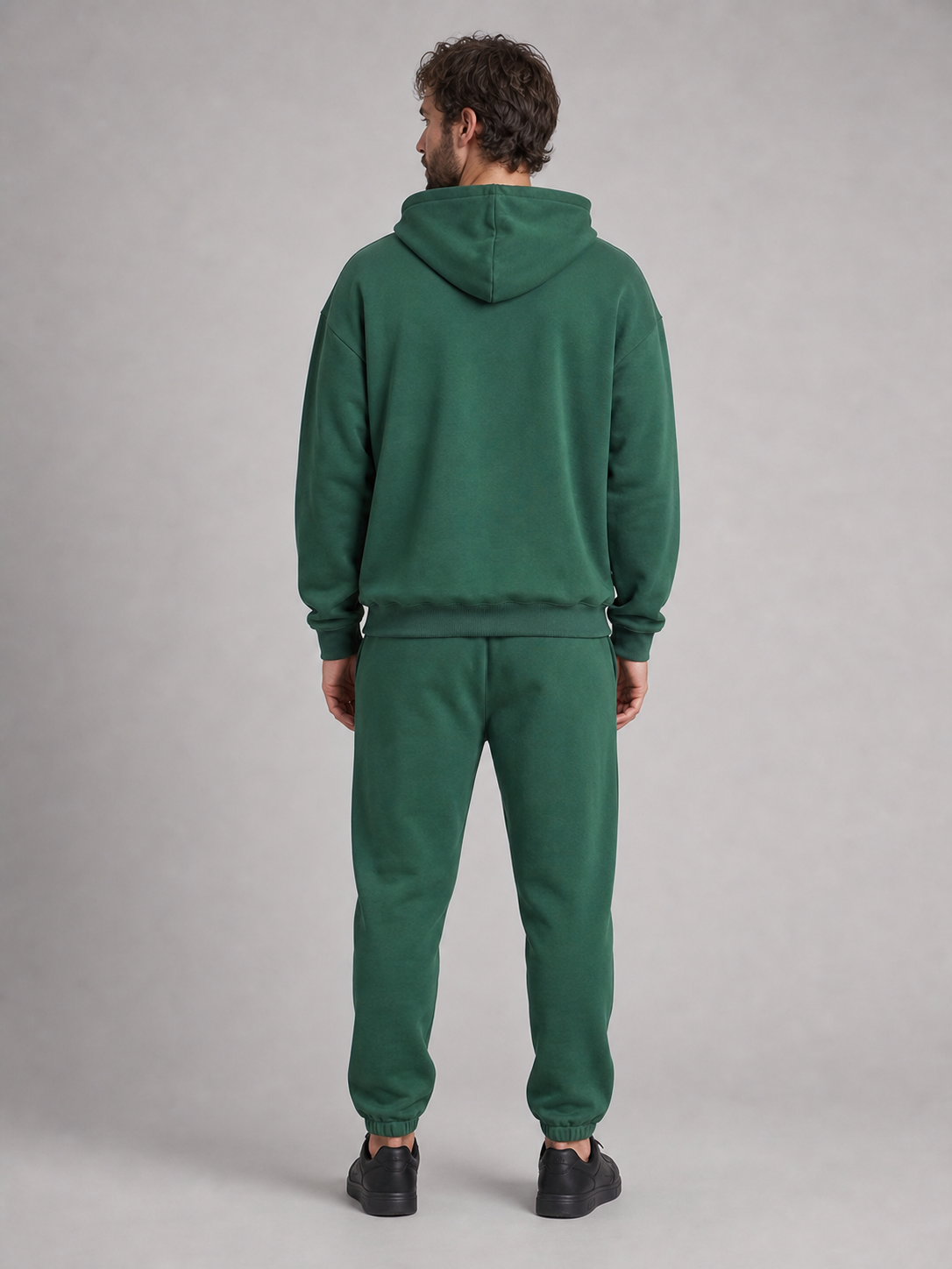 Men's forest-green pullover hoodie and jogger set back view
