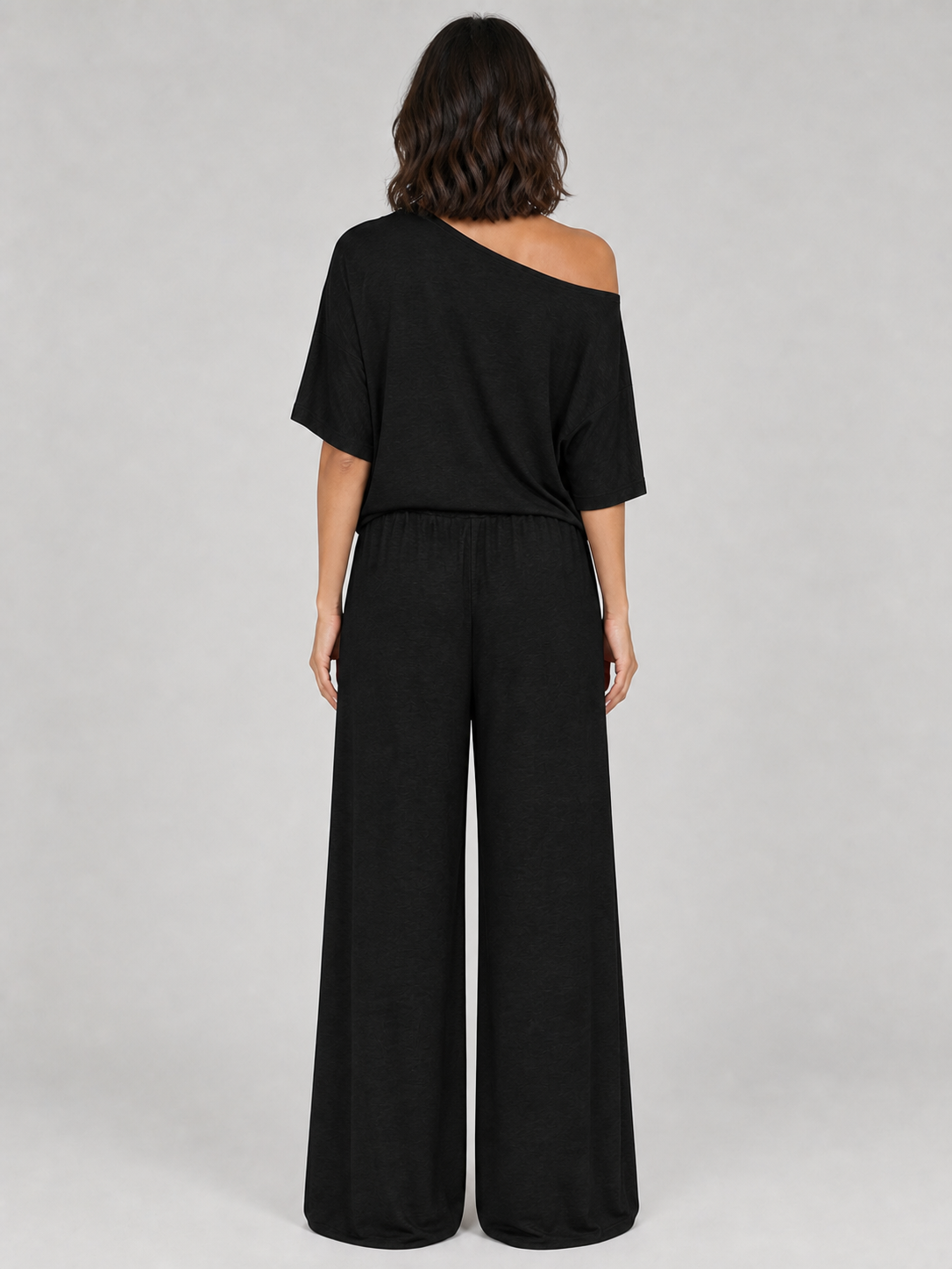 Women's black one-shoulder set back view