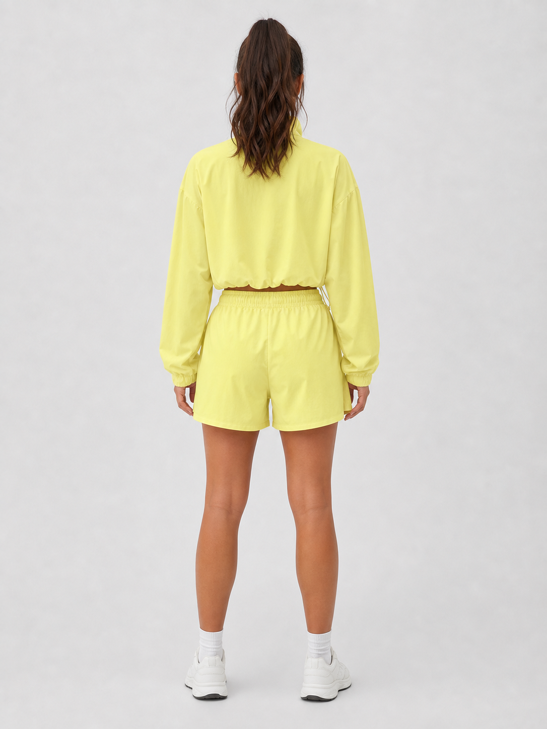 Women's citrus yellow half-zip pullover and shorts set back view
