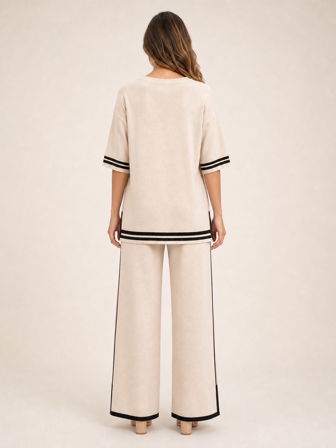 Women's warm ivory contrast trim knit top and wide leg pants set back view