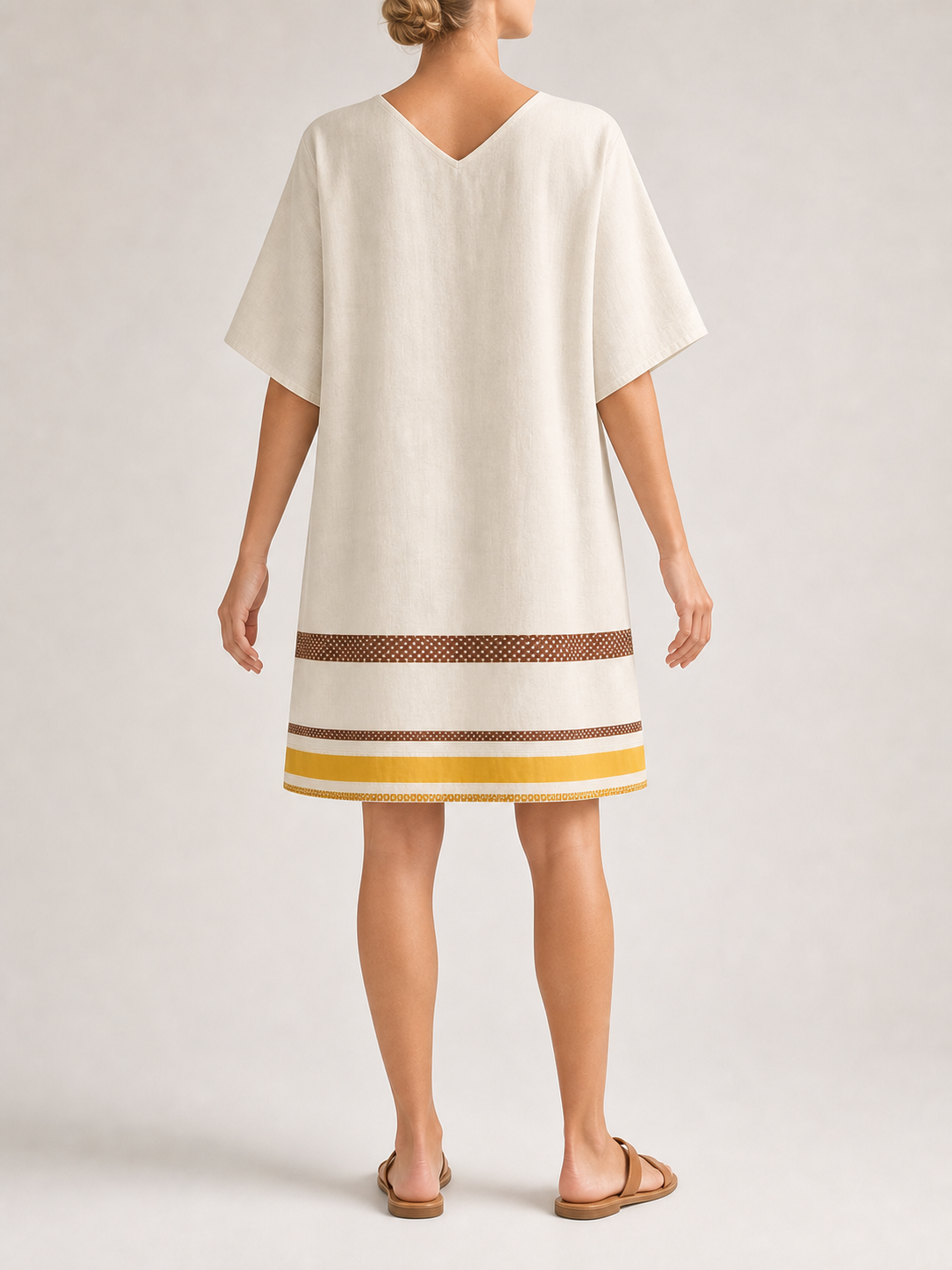 Women's ivory geometric trim kaftan mini dress back view